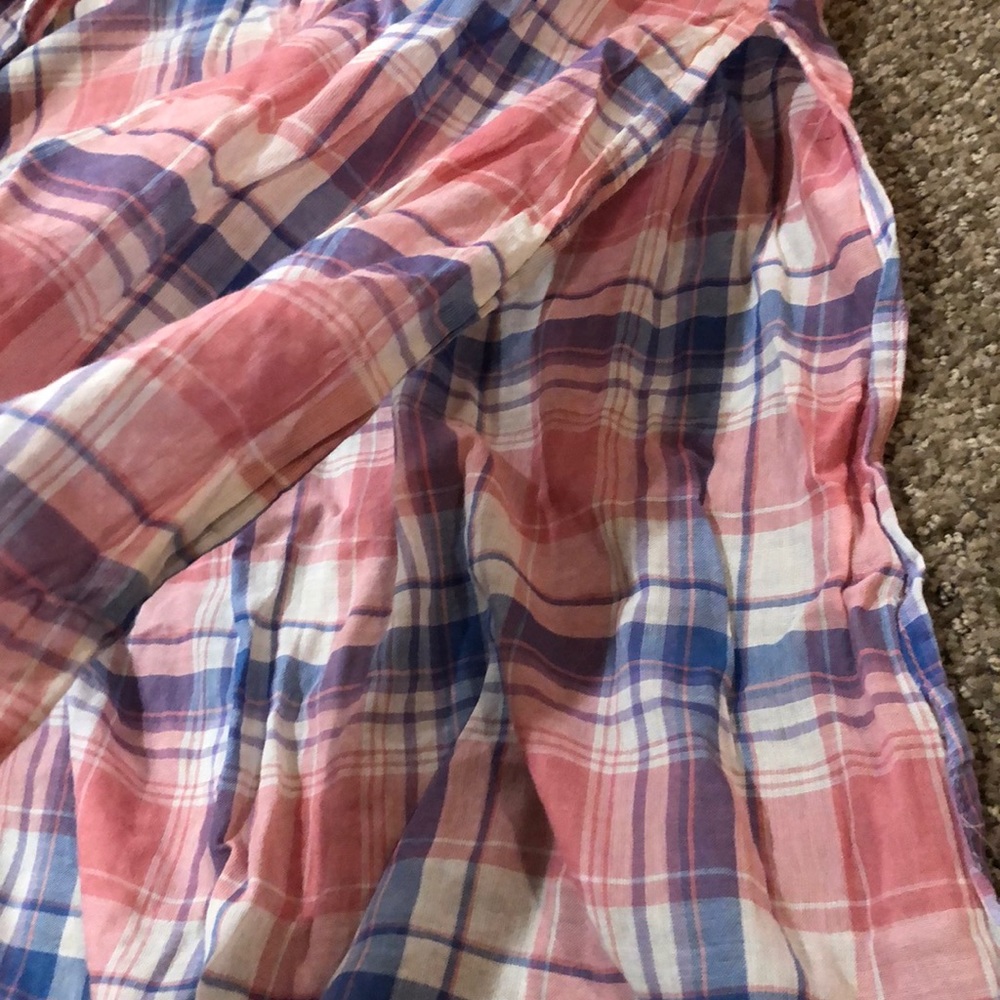 Long plaid shirt that has long side slits